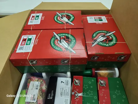 Shoeboxes are lovingly cartonized and ready for their journey into the hands of a child.