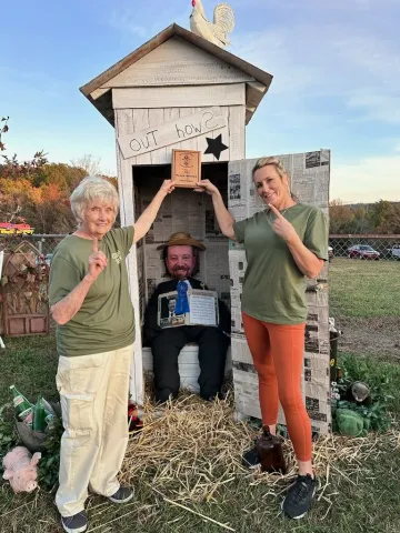 The Betty Dalton Gang with Mayor Jason Bailey in the outhouse