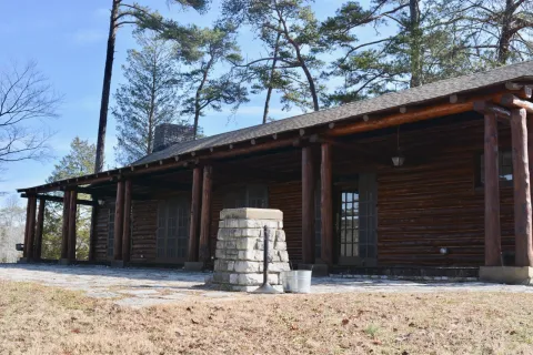 The Big Ridge Rec Hall exterior has been restored to a wood finish.