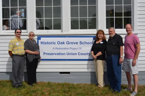  Preservation Union County board members Ronnie Mincey, Bonnie Peters, Betty Bullen and Robert Ellison stand with East Tennessee Preservation Alliance board president Scott Brooks.