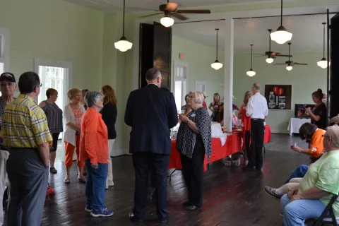  A crowd gathers to celebrate the newly renovated Oak Grove School, which will serve as the Sharps Chapel Book Station and a community room.