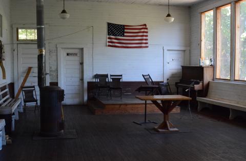 Inside Rush Strong School Rush Strong School houses monthly "jam sessions" for bluegrass and gospel music, with heat provided by original coal-burning stoves.