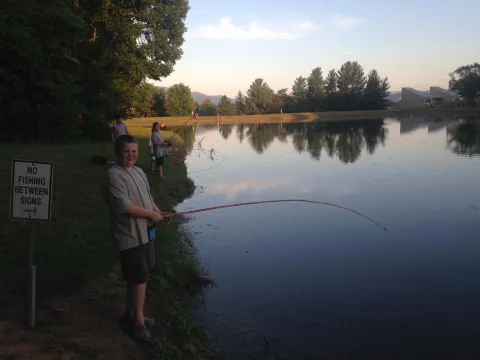 Aaron Clapp fishing at camp