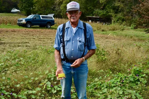 Homer Johnson on his small farm in Halls