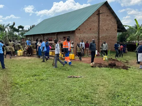 The borehole and church in Buwasyeba Uganda.