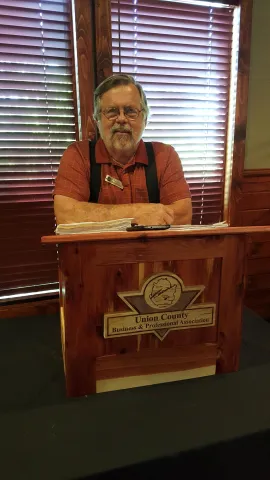 President Martin Shafer stands at the podium