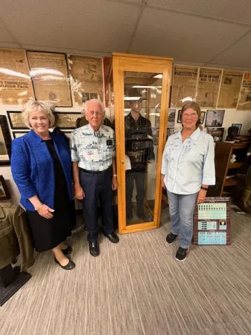 TSDAR State Regent, Emily Robinson,Judson Palmer,UCHS Chairman of the board and Veronica Fox UCHS Board Member pictured with Spanish American War Uniform on Display