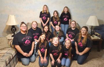 Photo by Earleen Wolfenbarger Front row: Emma, Allie, Mary Middle row: co-leader Kristina, Sarah,  Layla, Katelyn, Loretta, Troop Leader Michelle Back row: Alexis, Zoe, viper