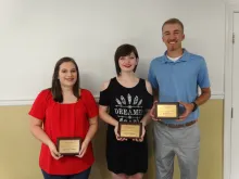 Samantha Sutton, Destini Thomas, Seth Beeler with plaques.