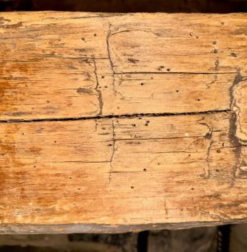 Photo by Steve Roark These pin holes in a 100 year old wood beam  were made by Deathwatch Beetles, which caused  some spooky superstitions back in the day.