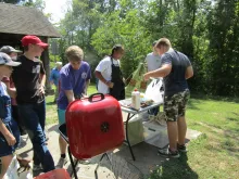 The photo shows from left to right:  Zeeva Boucher, Jonathan Tindell, Kaleb Hanna, Jessie Garcia, Jeremiah Tindell, and Travis Hanna