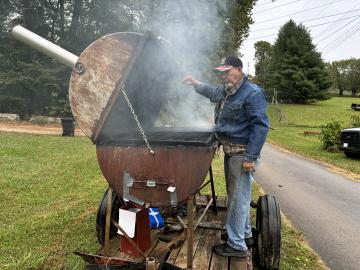 Arnold Smallin and his well-made, homemade smoker