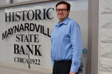 Interim Chamber of Commerce president Thomas Skibinski stands in front of the Chamber's office, currently housed in the historic Maynardville State Bank building.